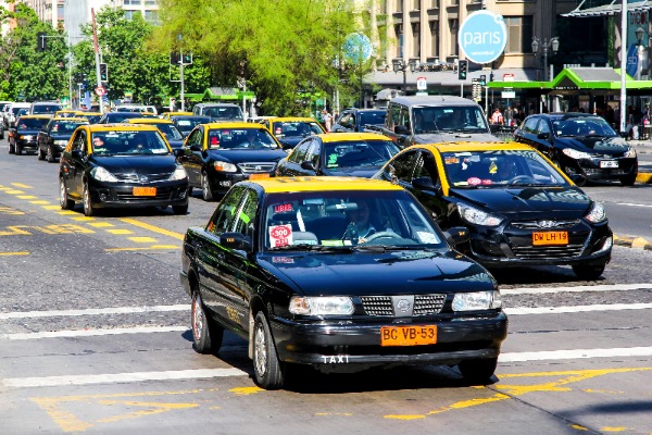 Tourist Places South America: Taxicabs in Santiago, Chile (Credit: art_zzz through Adobe Stock)