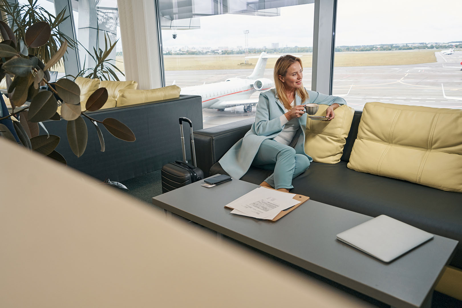 blonde enjoying airport lounge